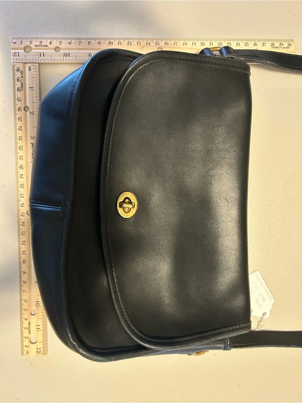 Coach Vintage City BagClassic Black Leather Crossbody Bag with Turn-Lock Closure